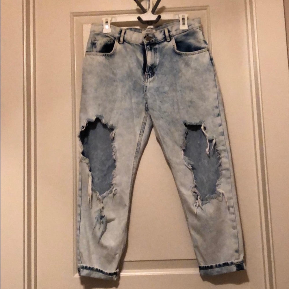 Ripped knee jeans